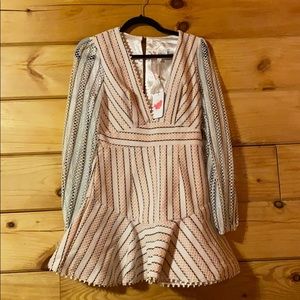 Cocktail dress with see-through lace sleeves